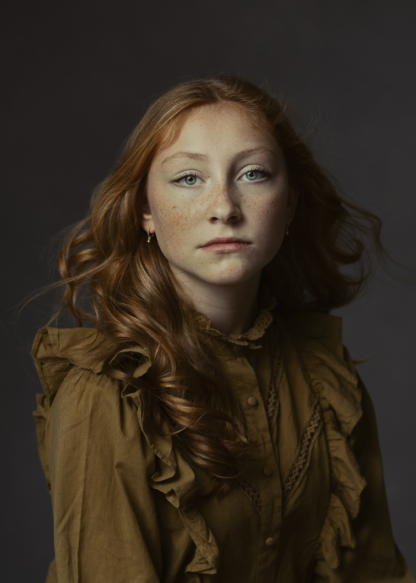 Portret meisje met petrolblauwe blouse